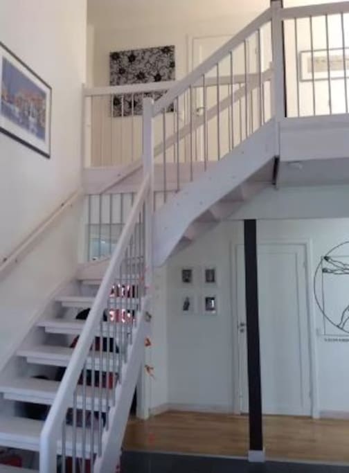 The spacious entrance with stairs to second floor and your bedrooms.