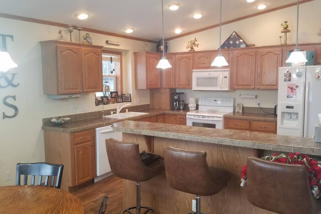 Kitchen with high counter for additional dining space.