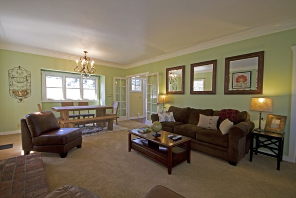 Open living room with sofa sleeper and large LCD flat screen w DVD player