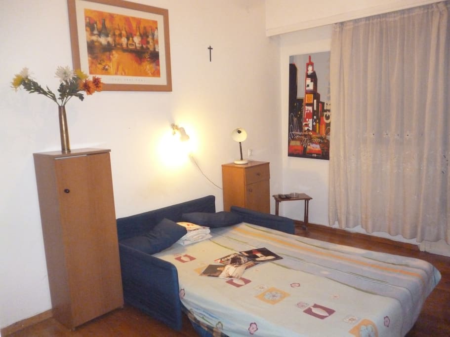 Your double bed bedroom with TFT TV, plenty of room for your clothes that leads to your balcony and backyard.