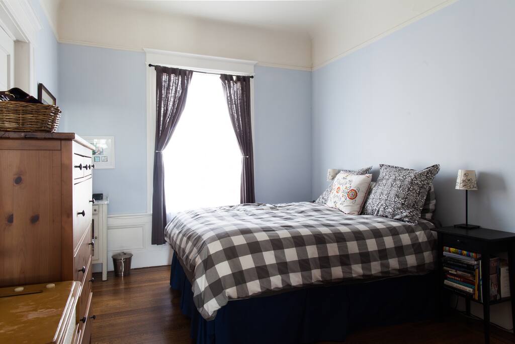 Master bedroom with crown moldings faces a quiet (for San Francisco!) street.