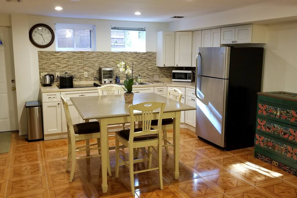 Kitchen includes stove, microwave, fridge, kettle, toaster-oven, dishes and all utensils.