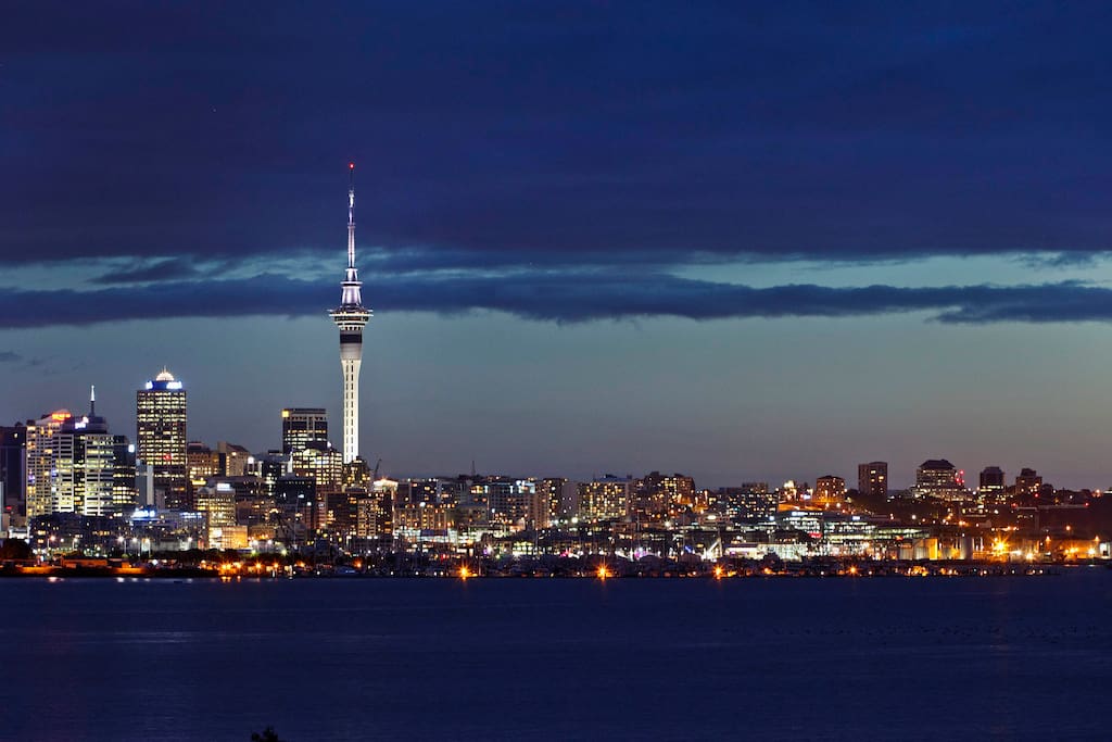 We are located to the right of the Sky Tower.