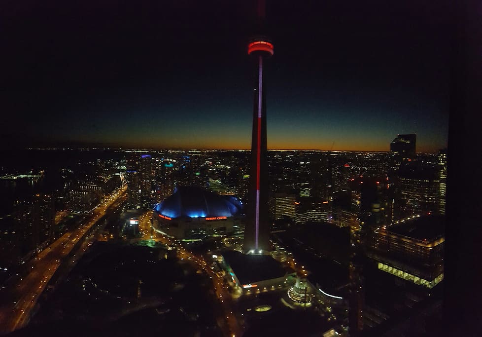 Picture of the city taken at night from balcony.