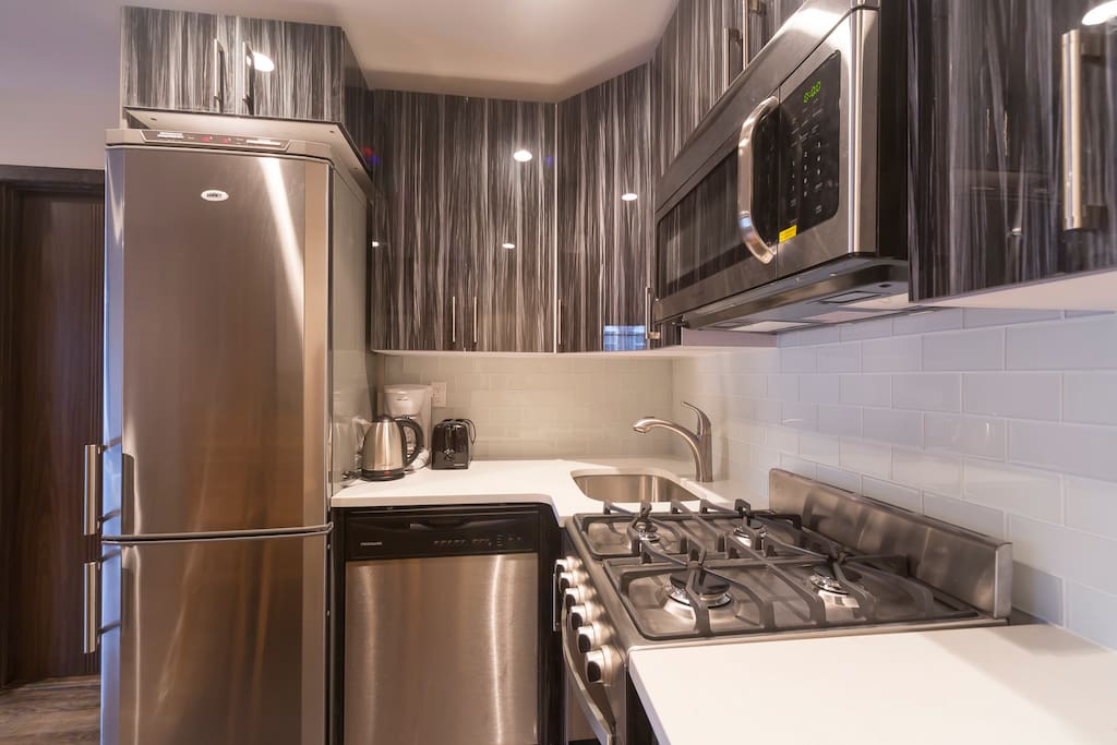 Stainless steel appliances, and a dishwasher