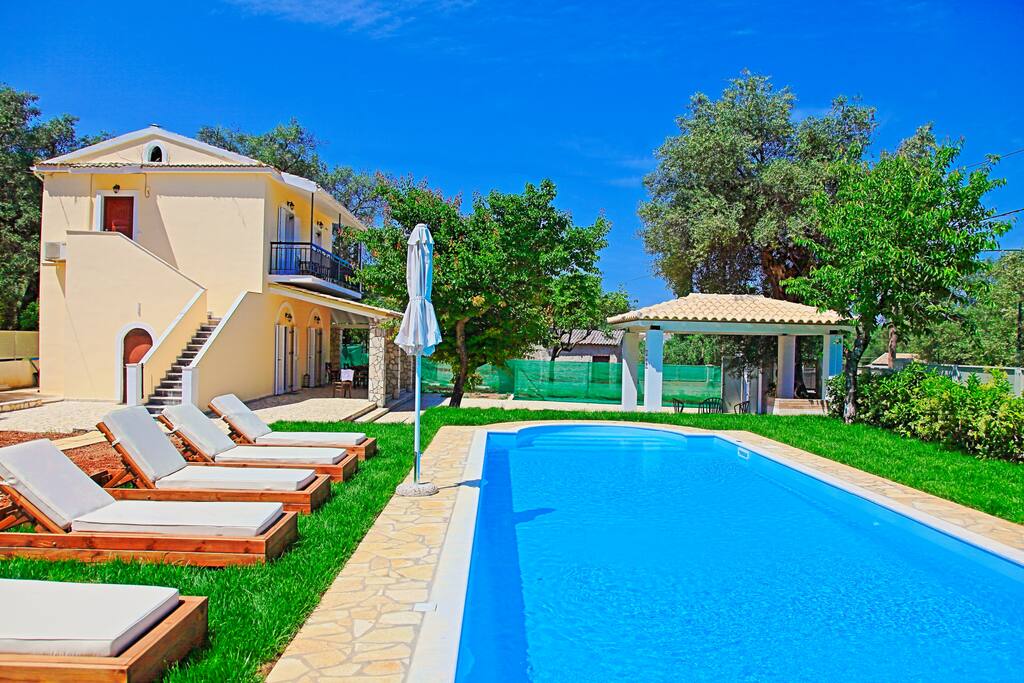 Sun-loungers around the pool