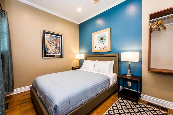 Bedroom Suite 2 - main floor with queen beauty-rest luxury plush bed, comfortable upholstered furnishings, flat panel TV/cable, WiFi and more.