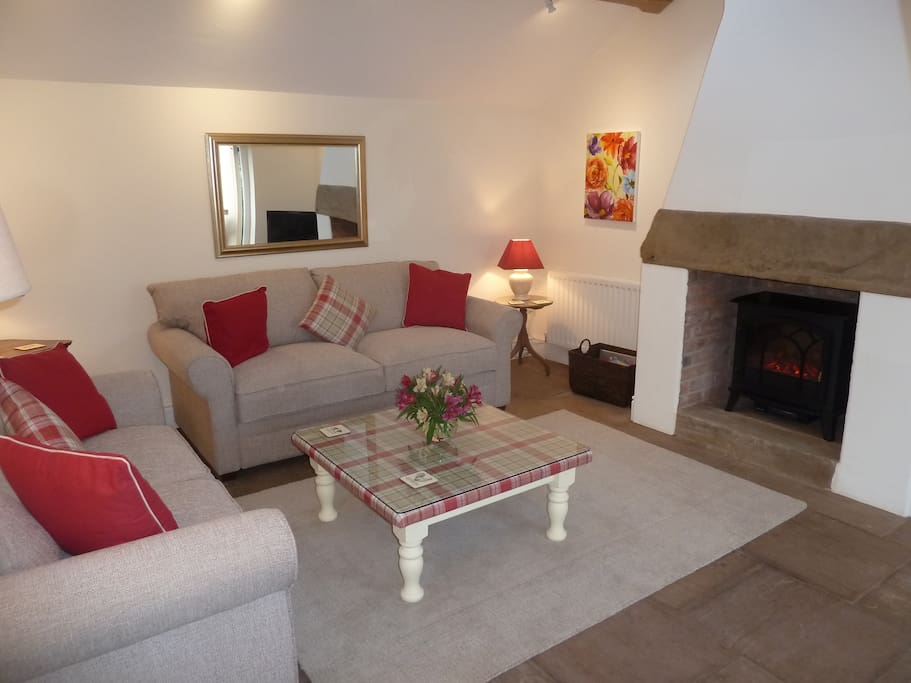 Sitting room with log-effect fire