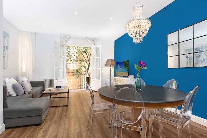 Living room with big balcony facing a quiet street
