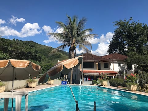 Big house with waterfall