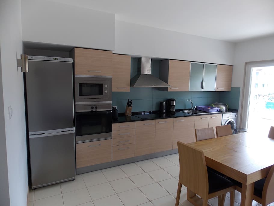 modern Kitchen with full fridge freezer , microwave , hob , washer , juicer and coffee percolator
