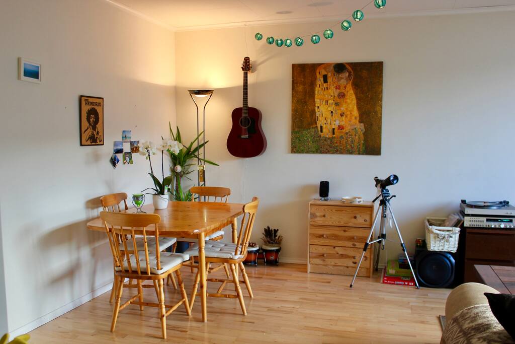 This is our dinner table! We also have a telescope and a guitar that is available for anyone :)