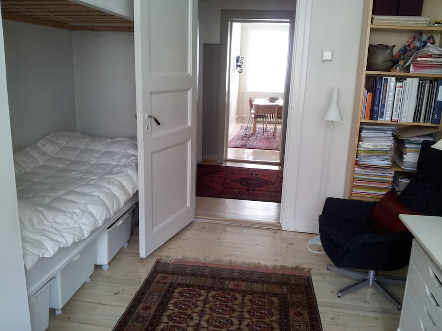 Comfortable room with good lighting, warm duvet, clean sheets, reading area and writing table.