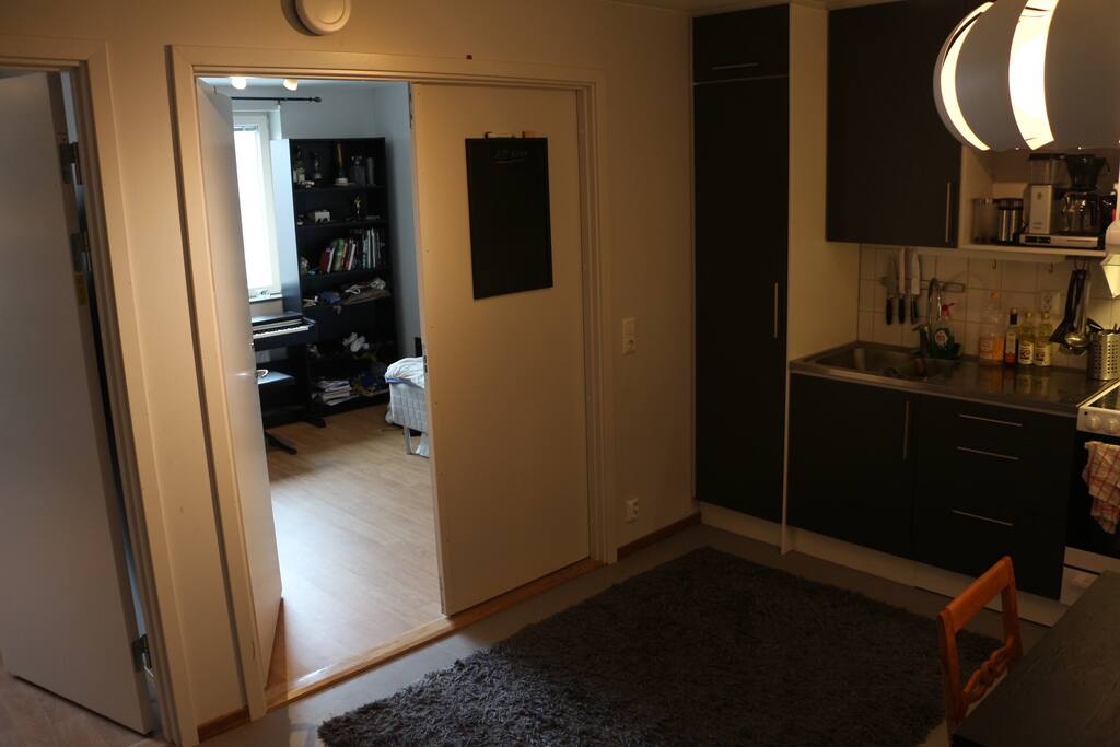 Direct access to two light bedrooms from kitchen.