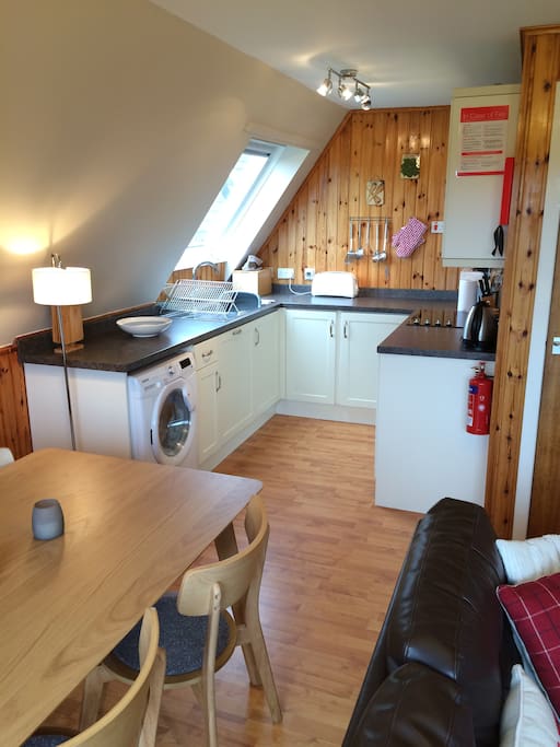 Fully equiped kithchen with washer/dryer, dishwasher fridge, oven, hob and microwave.