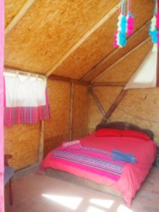 Big comfortable double bed with feather duvet