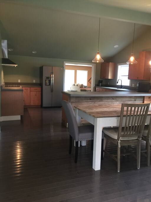 Reclaimed lumber farm style dining table. Seats 10.