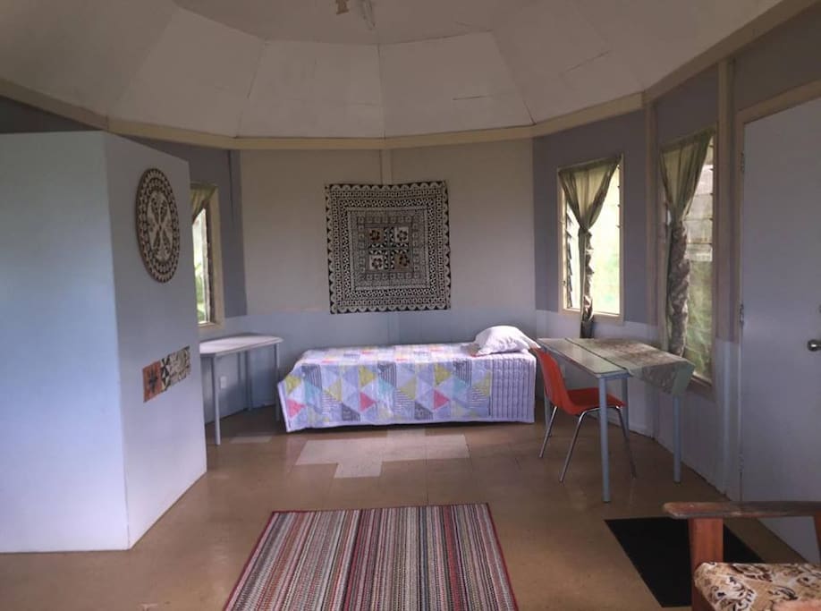 Single bed in shared space