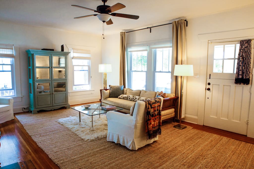 The main living room with lots of windows