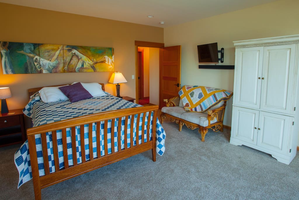Your bedroom with queen bed.