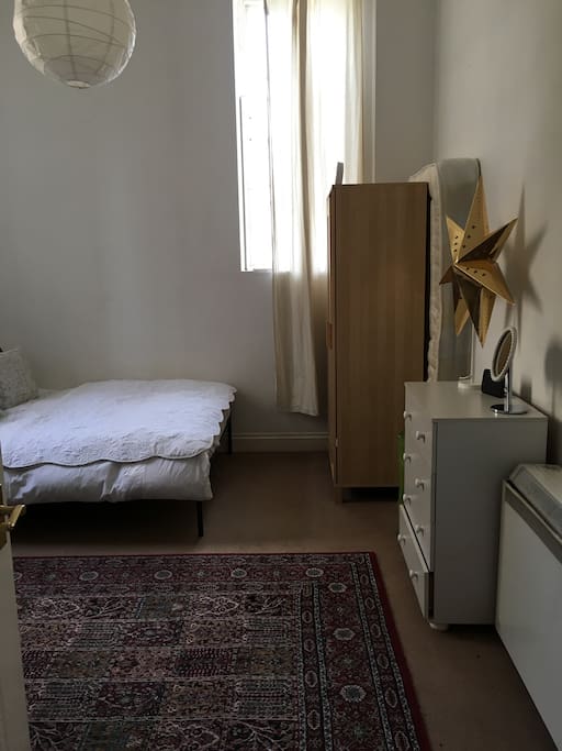 Double wardrobe, chest of drawers, additional single mattress for 3rd person if required