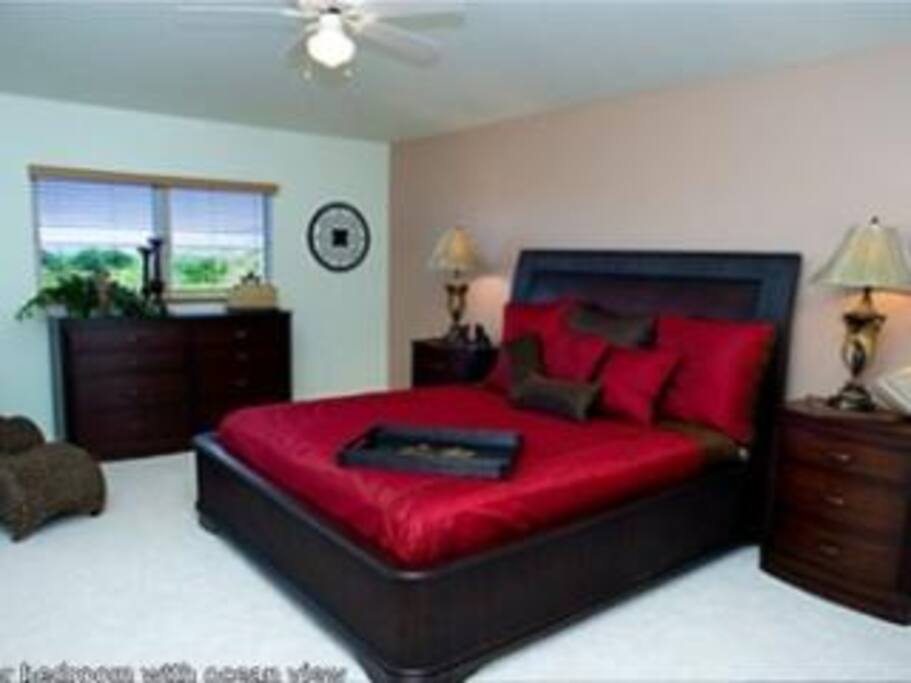 Master bedroom with ocean view, master bath and lanai