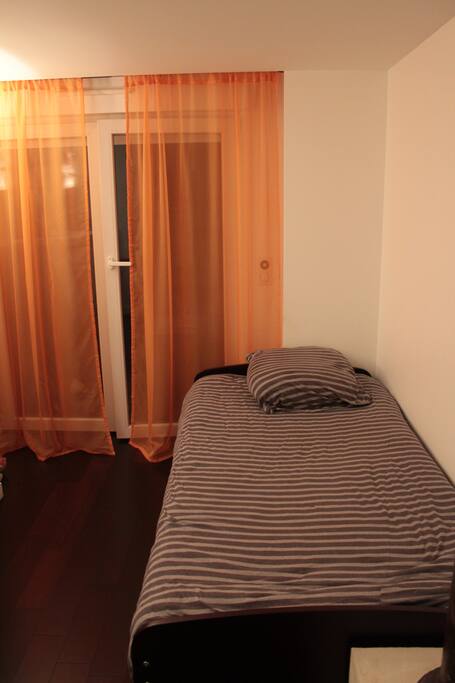 First bed in bedroom (second bed hidden underneath)