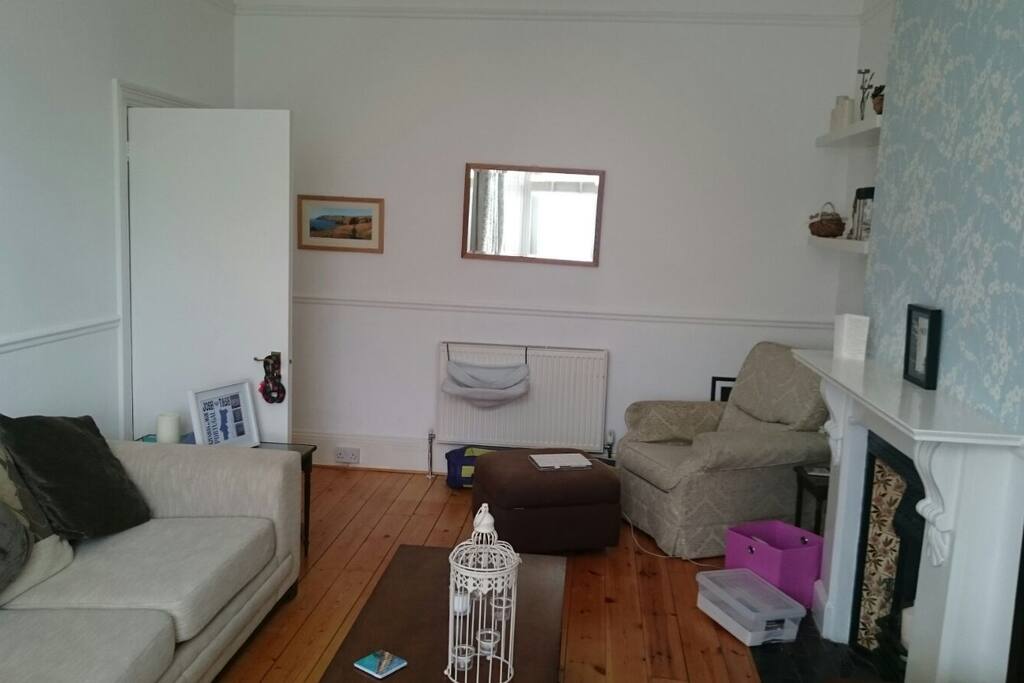 Reception room with original features and sofabed