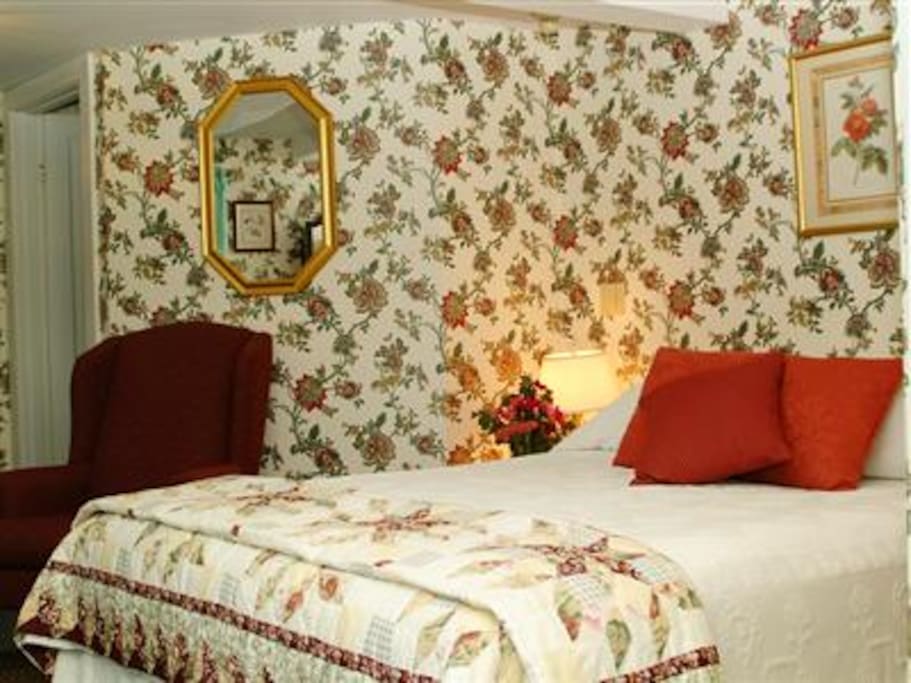 Room 6 in our 1820's farmhouse at Acadia's Oceanside Meadows Inn offering a meadows and gardens view, queen sized bed and private bathroom with large corner shower.