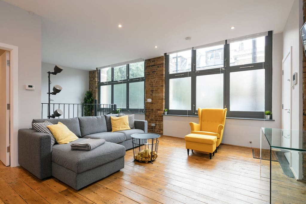 Large modern living room with plenty of sunlight