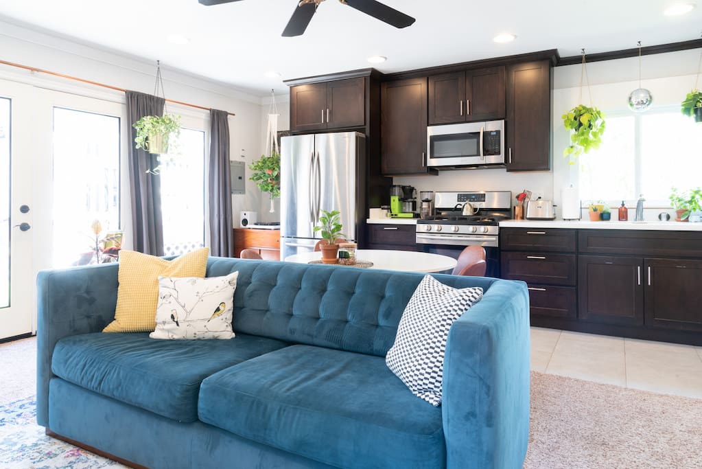 Spotted: A record player in the left corner. Fill the space with music by putting on a record, plugging your phone into the aux cable, or connecting via bluetooth.