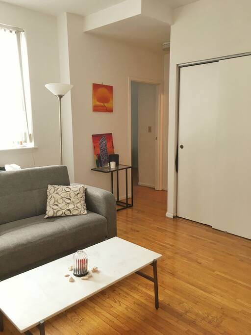 living room into bedroom and bathroom