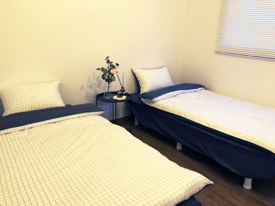 Room with two single beds