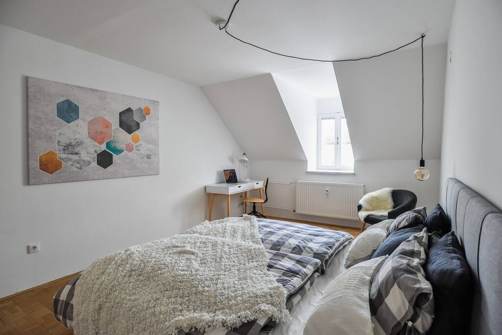 Master bedroom with a desk