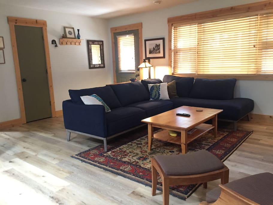 Front Door, coat closet and Living Room
