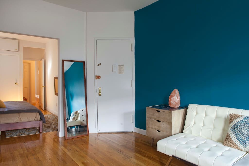 View from your private living room/workspace into your bedroom. Curtains can be closed to separate.