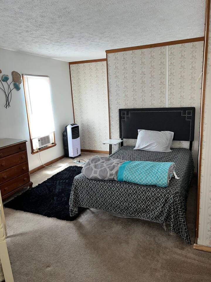 1st bedroom with full bed and twin bed