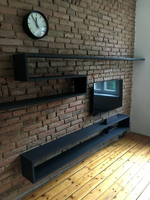 In the living room you can find TV with Wi-Fi and Bluetooth speaker for your mobile phone music.