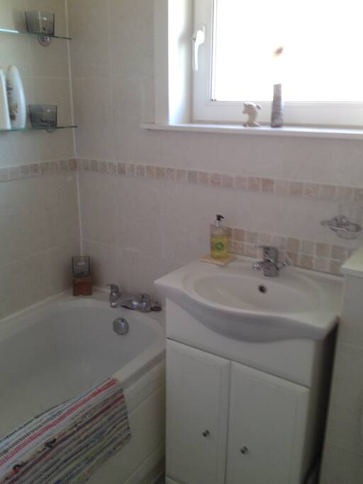bath with shower
shampoo and body wash provided