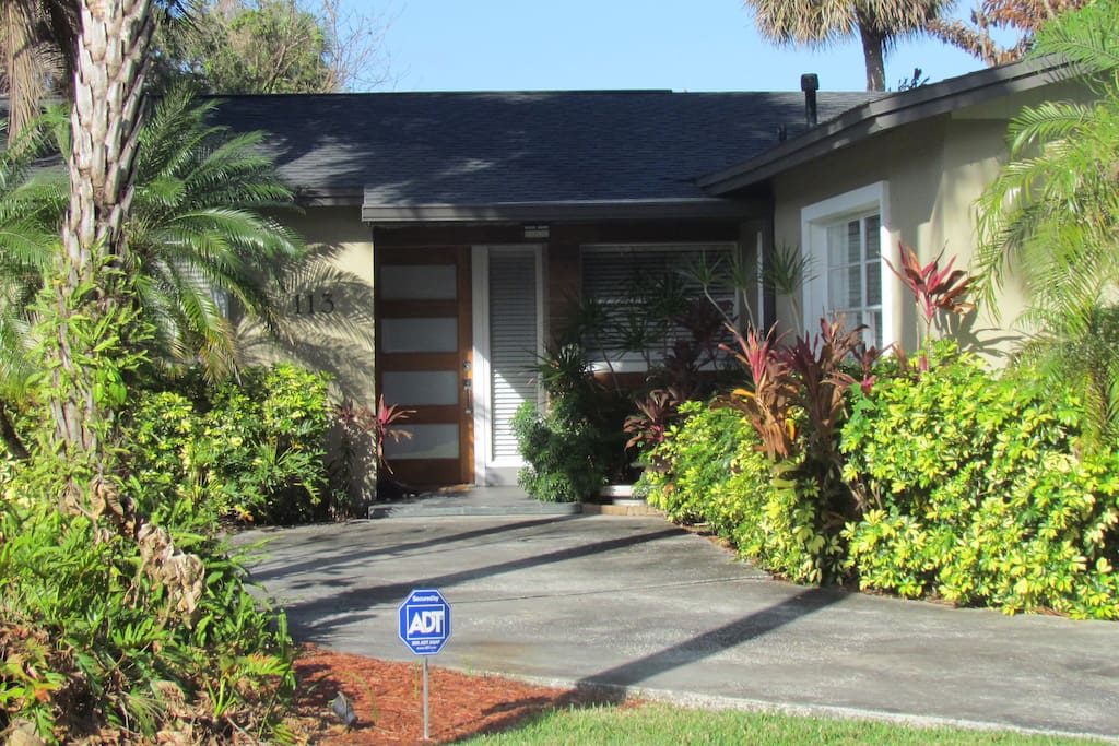 Enjoy palm trees, tropical birds and lush foliage throughout the property