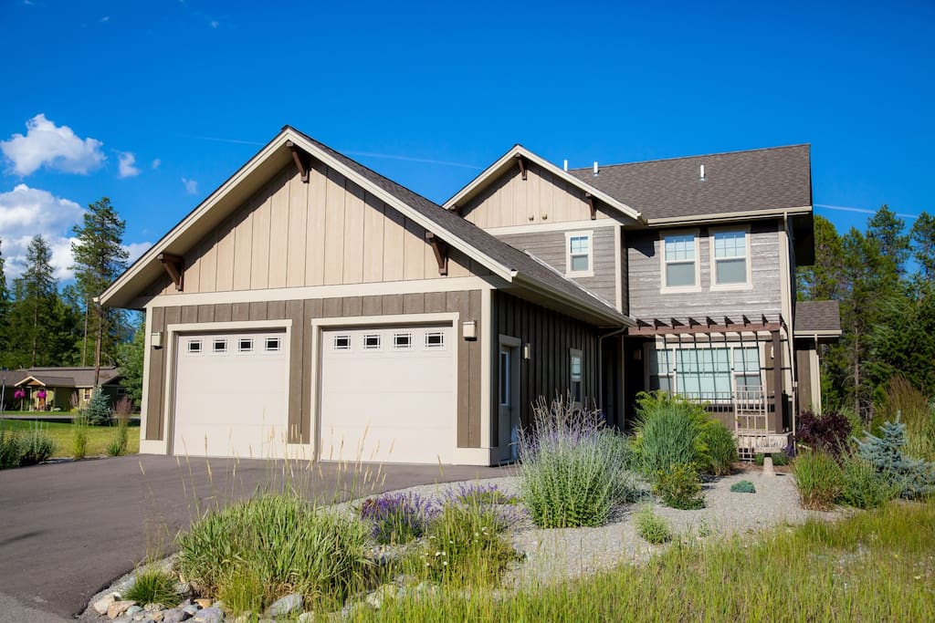 Attractive landscaping with lavender blooming. Beautiful house A must see