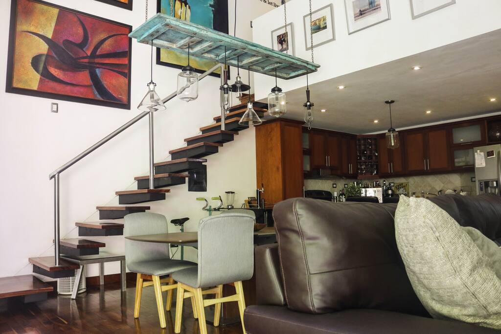 Social Area and the stairs that take you to the bedroom.