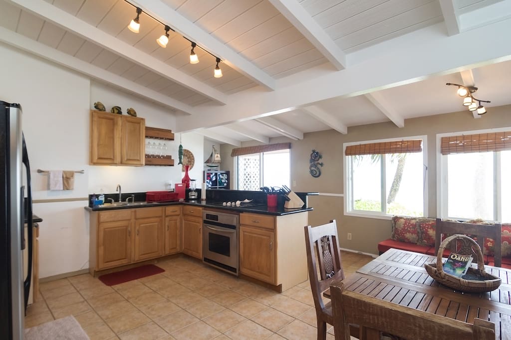 Spacious kitchen with wrap-around ocean views.