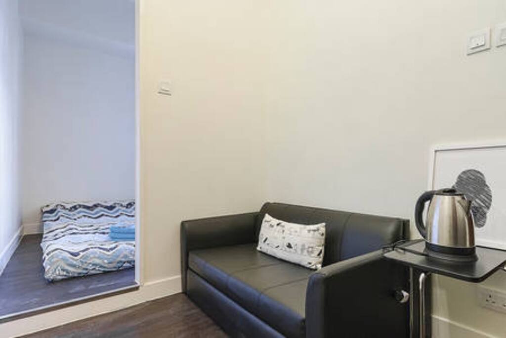 Cozy living room where you can sit and enjoy your morning coffee or night snack.