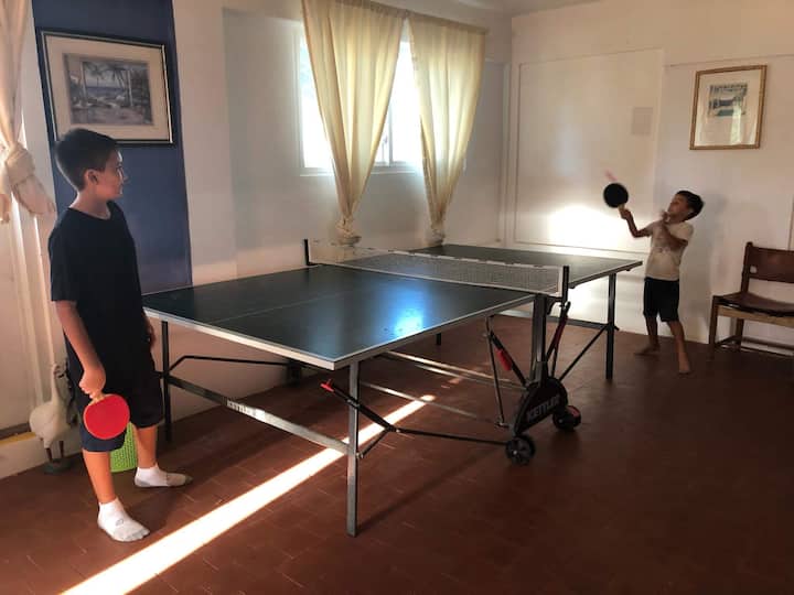 When it rains outside there’s still plenty of stuff to do inside the boys love ping-pong