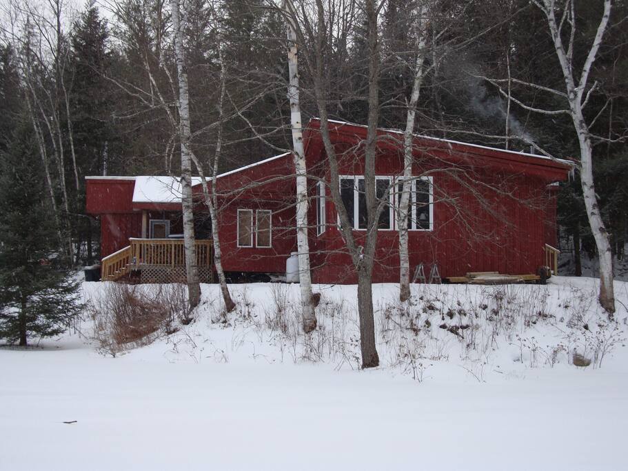 House from side of property near the running brook