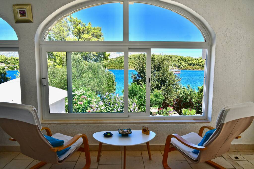 Enjoy the magnificent view of the sea and the mountain from your private sitting room.