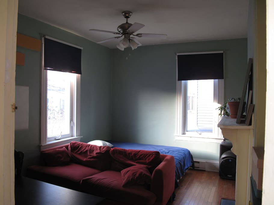 Spacious room with lots of light, hardwood floors and desk