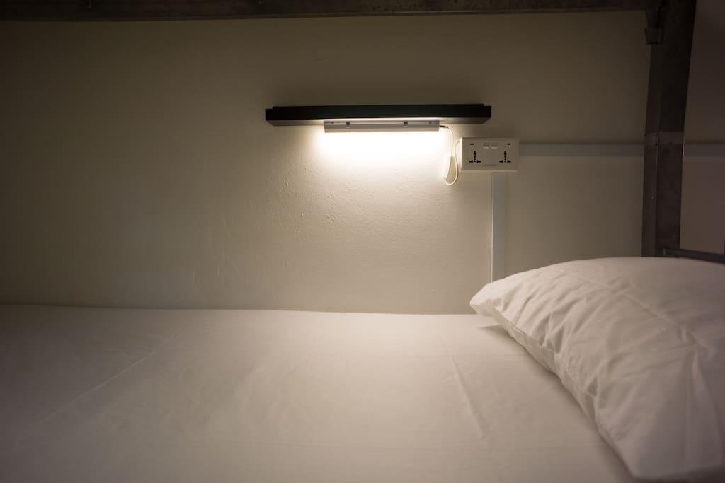 Individual reading light and shelves