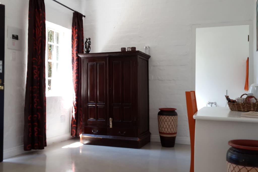 Desk and cupboard.